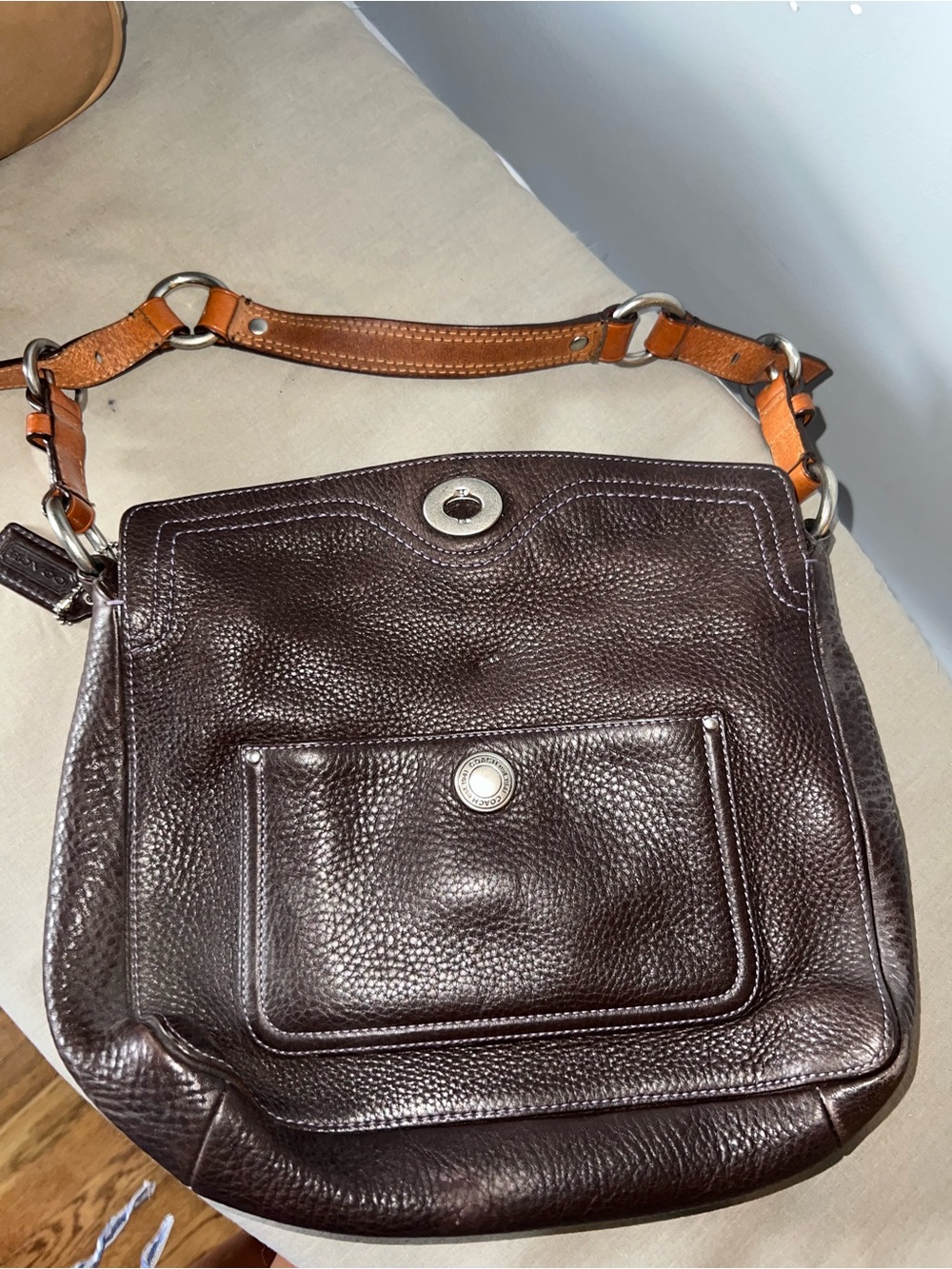 Coach Pebbled Leather Shoulder Bag in Dark Brown with Tan Strap